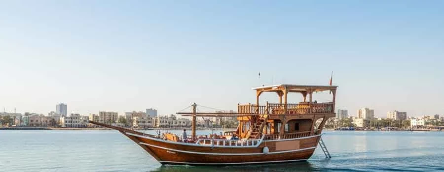 Back angled view with bag open and handles to the side.